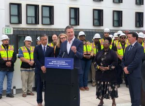 Newsom signs housing bill package to ‘turn up the heat’ on development-averse cities