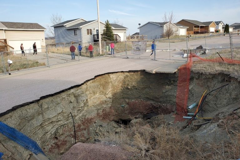 Sinkholes, and mines below, imperil South Dakota neighborhood