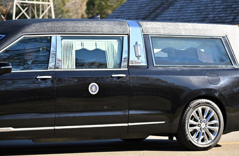 Jimmy Carter’s flag-draped casket on its way to Atlanta as 39th president’s state funeral begins