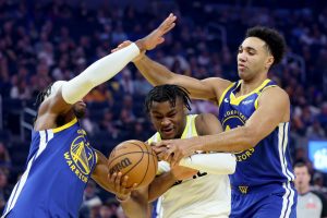 Warriors take care of tanking Jazz behind Podziemski, Schroder