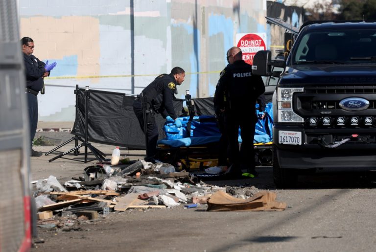 Two charged after man’s body found in bag in West Oakland