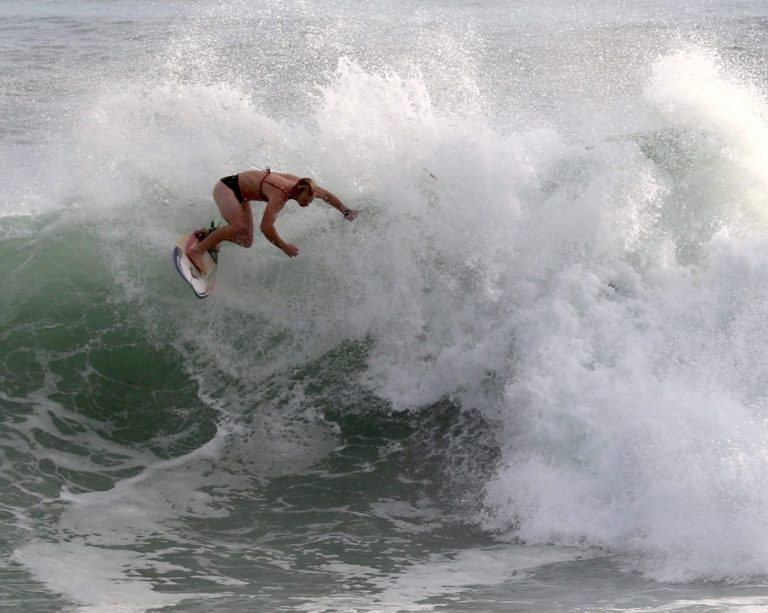 Santa Cruz surfer Nat Young shreds during chilly afternoon session – wearing a bikini