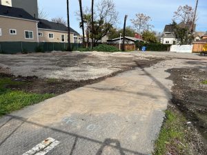 Fire-torched rubble of old Victorian homes is cleared away in San Jose