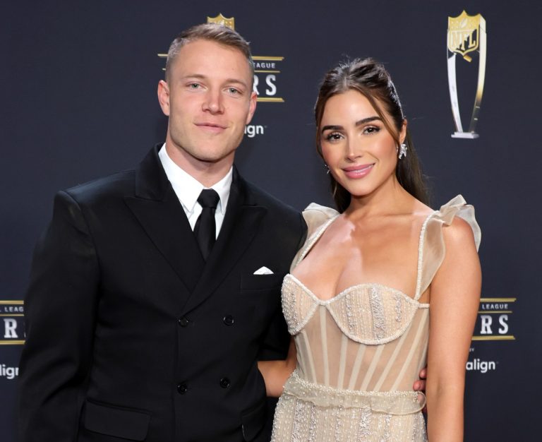 Olivia Culpo and Christian McCaffrey announce pregnancy with walk in a field