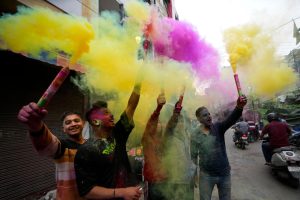 With a kaleidoscope of colors and music, the Hindu festival of Holi signals the arrival of spring